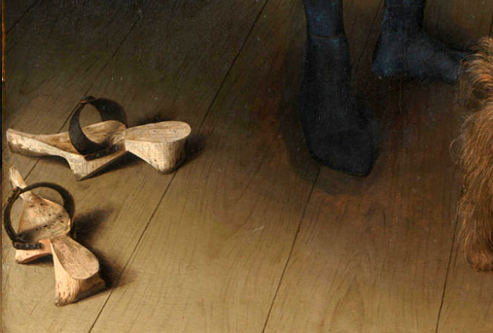 Griffon dog in The Arnolfini Portrait